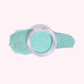 Aqua Blue Dip Powder For Nails with vibrant light blue tones and shimmering finish, evoking tropical waters.