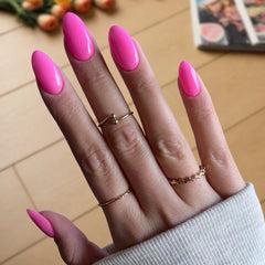 Bold Barbie Pink Dip Powder Nails showcasing a fun, bright pink manicure.