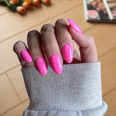 Bold Barbie Pink Dip Powder Nails for a striking pink pedicure.