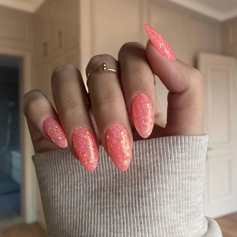 Bright Pink Orange Dip Powder Nails for a sparkling pink-orange pedicure with bold glitter