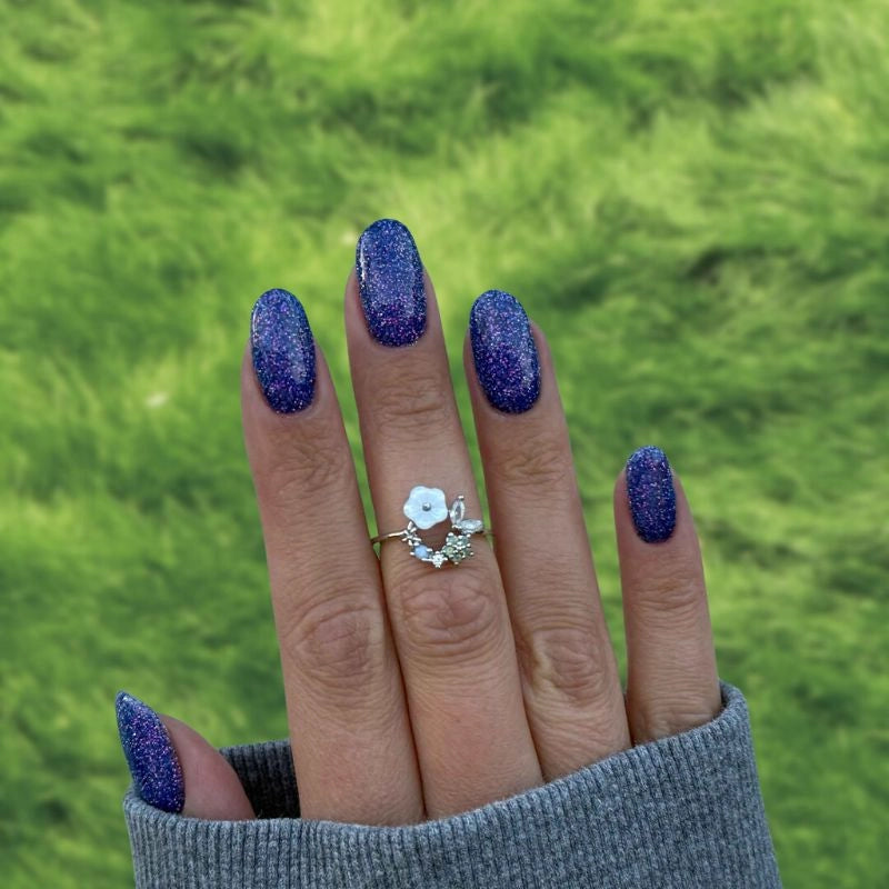 Iris Blue Dip Powder For Nails for a stunning blue pedicure with purple undertones and fine shimmer.