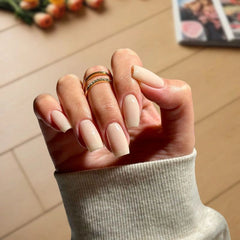 Close-up of Ivory Glow Dip Powder Nails giving a polished and elegant look.