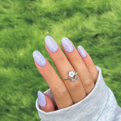 Murano Blue Mixed Glitter Dip Powder For Nails showcasing a serene blue manicure with vibrant, colorful glitter accents.