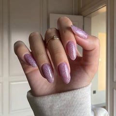 Sparkling Rose Pink Dip Powder For Nails showcasing a rose pink manicure with a delicate shimmer, perfect for a romantic, glowing style.