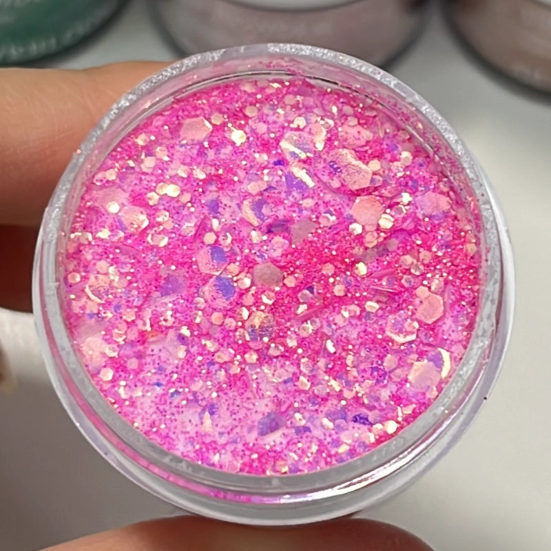 Blossom Stardust dip powder in soft pink with layered sparkling glitter