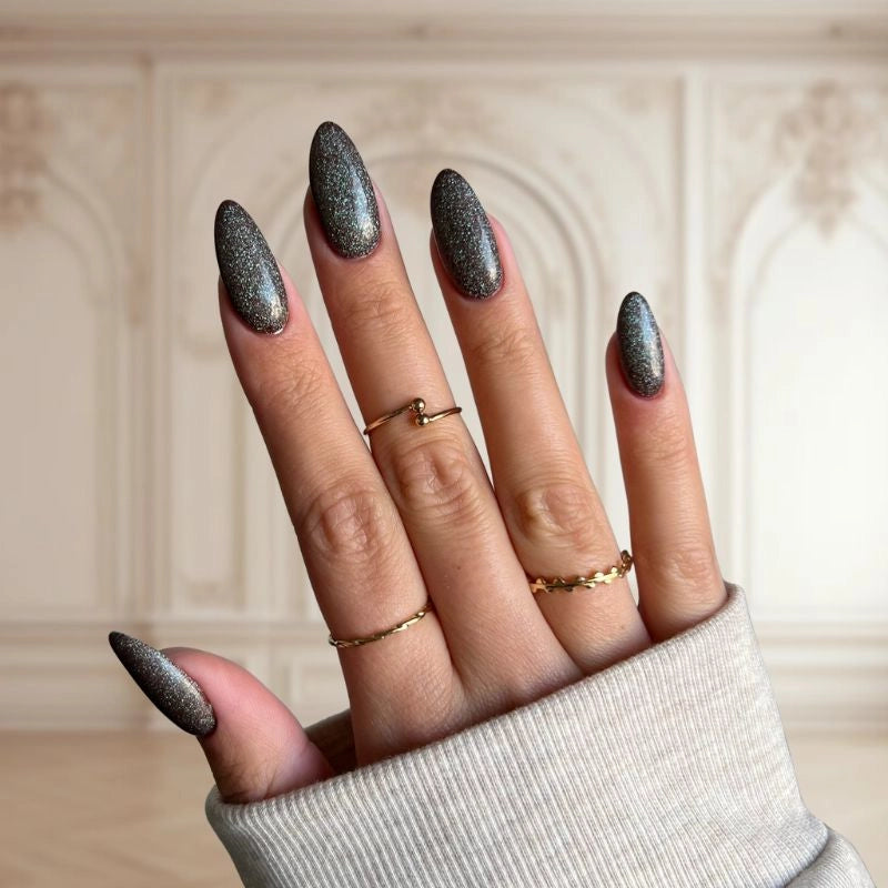 DIY manicure using Brown to Green Color-Changing Dip Powder For Nails creating a unique color-shifting finish.