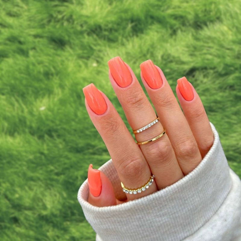 Carrot Orange Dip Powder for Nails applied for a bold, colorful DIY manicure.