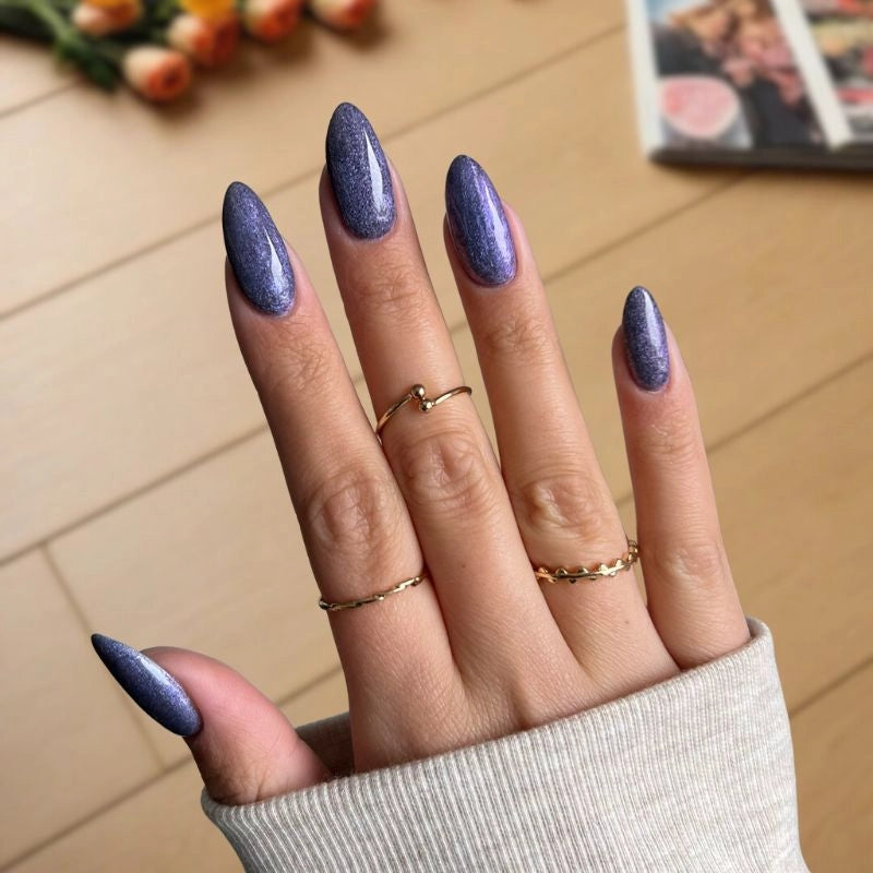 DIY manicure using Deep Violet with Fine Sparkle Dip Powder For Nails for a glamorous, customizable finish at home.