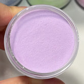 Delicate and dreamy purple nails using Lilac Whisper dip powder