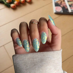 DIY Mint Sparkle Dip Powder Manicure – Fresh, sparkling nails with shimmering glitter.