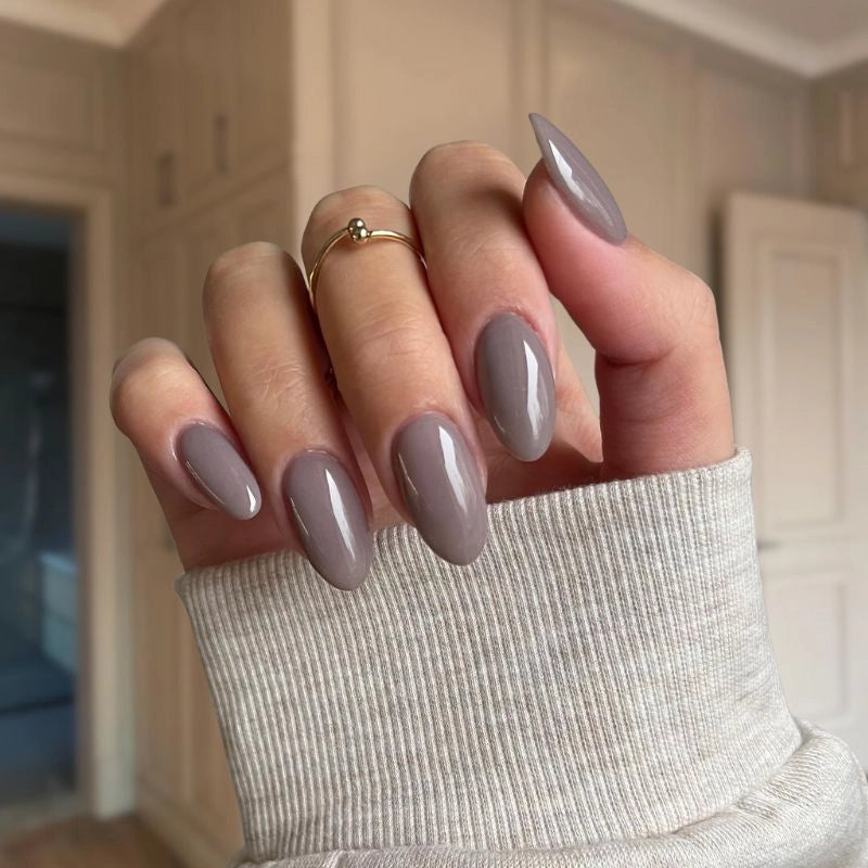 Misty Grey nails offering a sleek, bold look with a matte-like texture and refined grey tone.