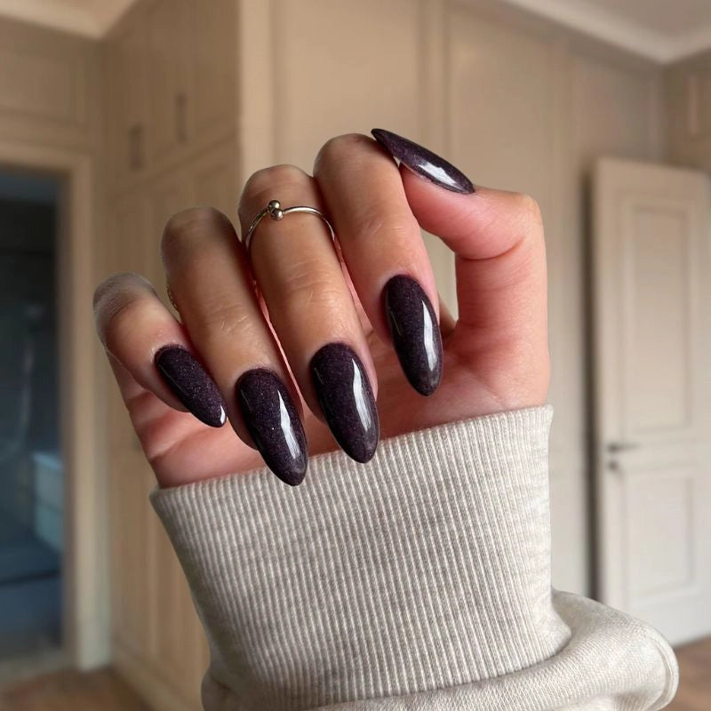 Close-up of Metallic Chestnut Red Dip Powder, featuring rich red tones with sparkles.