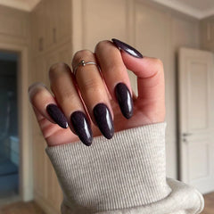 Close-up of Metallic Chestnut Red Dip Powder, featuring rich red tones with sparkles.