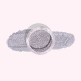 Silver Shimmer Dip Powder for Nails – A chic silver base with sparkling glitter that reveals a purple glow in sunlight.