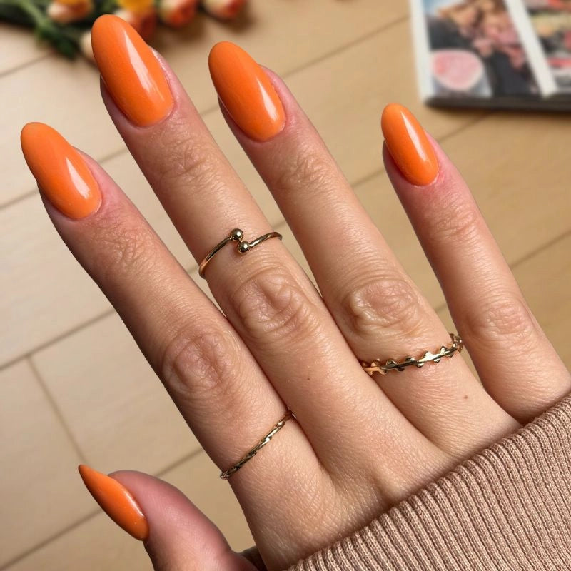 Cozy autumn manicure using Sweet Pumpkin Dip Powder for Nails with vibrant pumpkin hue.