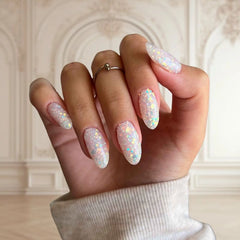 DIY manicure using White with Sparkles and Soft Milky Tint Dip Powder For Nails for a soft, sparkling finish at home.