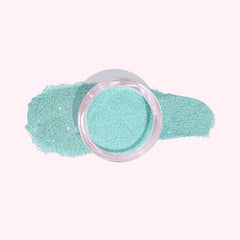 Aqua Blue Dip Powder For Nails with vibrant light blue tones and shimmering finish, evoking tropical waters.