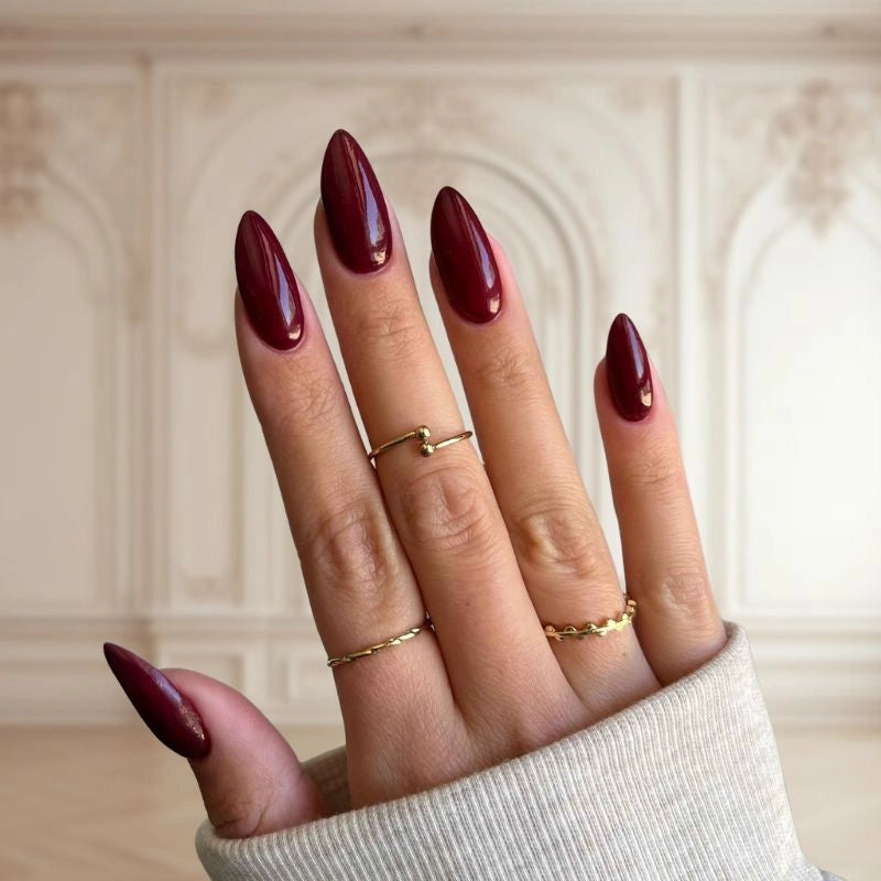 Deep Burgundy Dip Powder for nails, providing a rich, wine-inspired shade for a bold look.