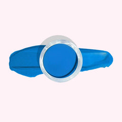 Royal Blue dip powder for nails in a container showcasing the deep, vibrant blue shade.