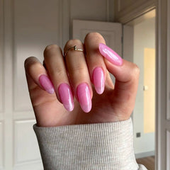 DIY manicure using Barbie Pink Transparent Dip Powder For Nails for a fun, customizable finish at home.