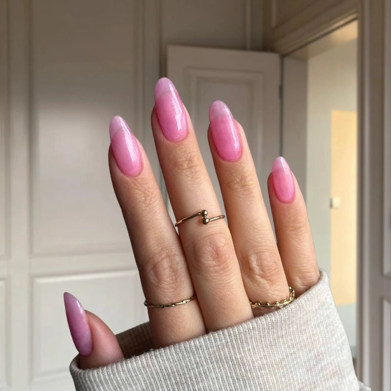 Barbie Pink nails creating a bright, playful look with a noticeable pink tint.