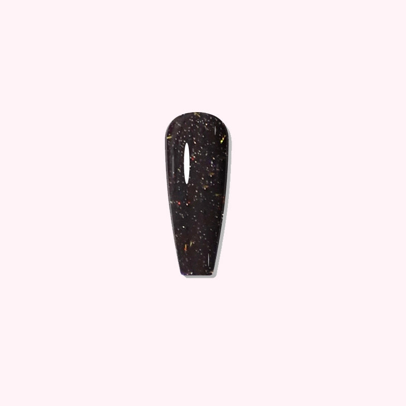 Galaxy Noir dip powder applied on nails, showing rich black with delicate, colorful sparkles