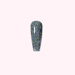 Crystal Wave dip powder with clear blue base and colorful glitter flakes