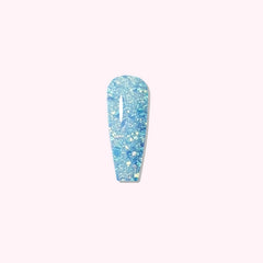 Glittering ice-blue manicure with layered shimmer using Icy Stardust