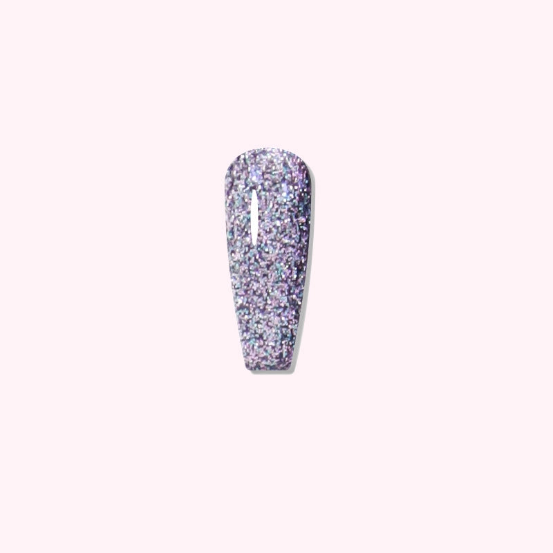 Cosmic-inspired manicure featuring Nebula Night dip powder