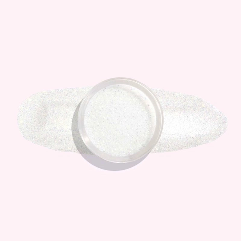 Pearl Glow Dip Powder for Nails showcasing its white, pearl-like shimmer with delicate sparkling flecks.