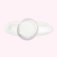 Pearl Glow Dip Powder for Nails showcasing its white, pearl-like shimmer with delicate sparkling flecks.