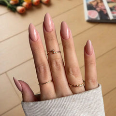 Chic pink nude dip powder for nails offering a delicate, smooth finish ideal for an everyday natural nail design.