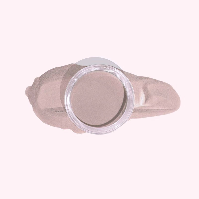 Powdered pink nude dip powder for a natural and elegant at-home manicure.