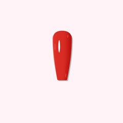 Classic glossy red manicure with a vibrant, confident tone from Ruby Flame