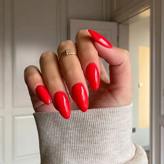 DIY manicure using Vibrant Red Dip Powder For Nails for a bold, salon-quality red finish at home.