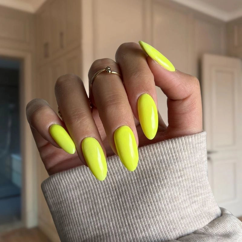 DIY manicure with Vibrant Yellow Dip Powder For Nails creating bright, salon-quality nails at home.